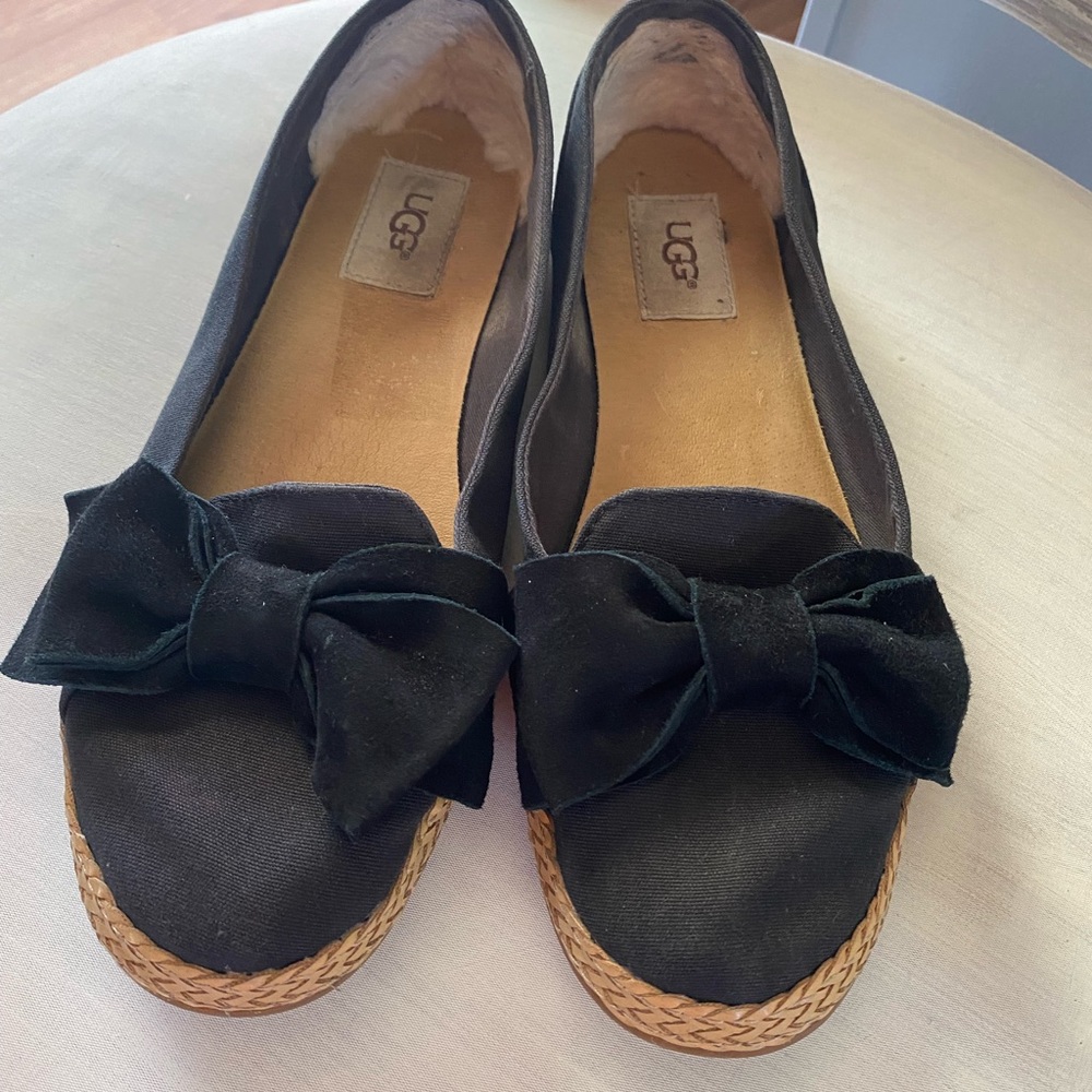 Ugg slip on with leather bow, worn but still in good shape.